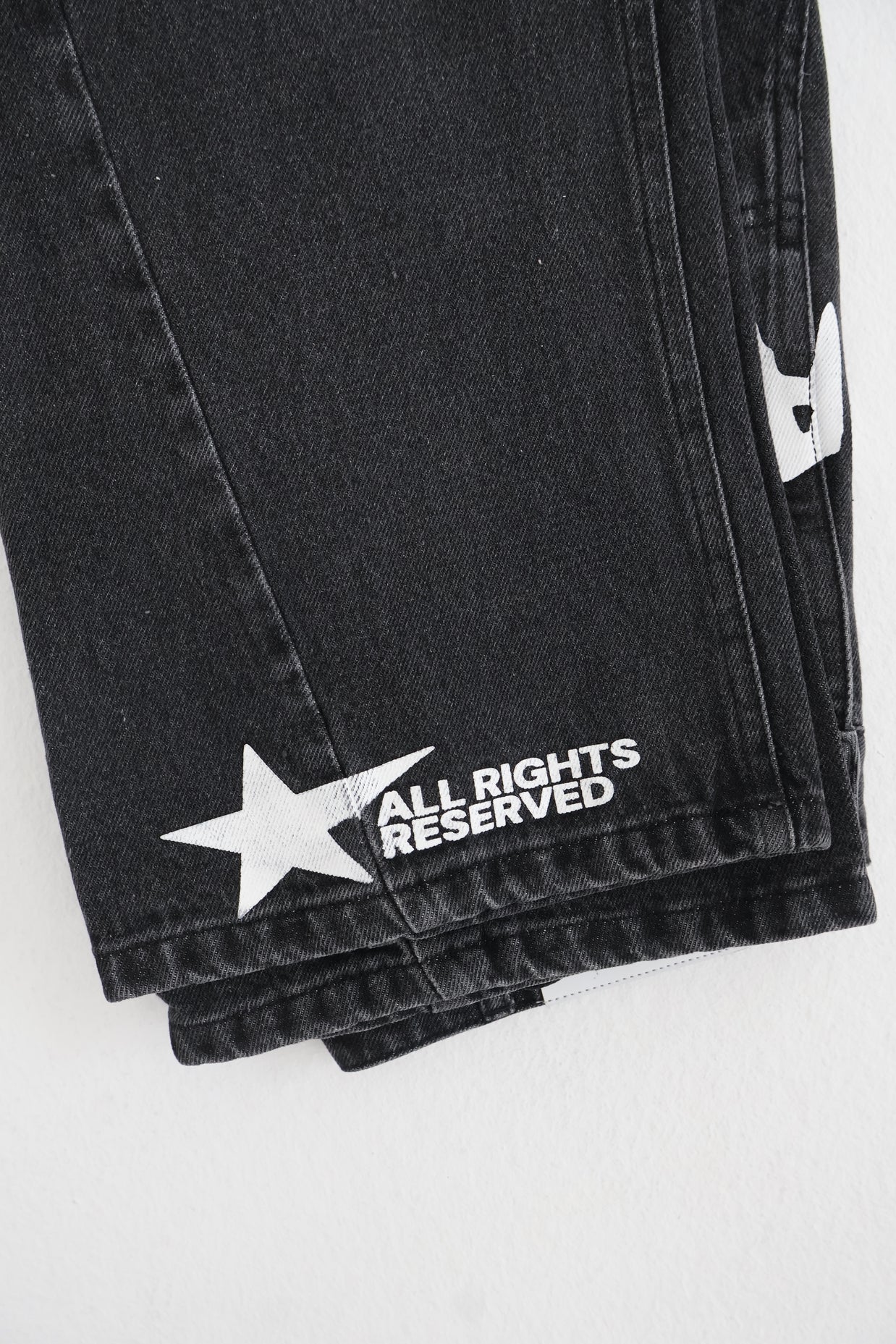 'FADED BLACK' FLARE-LEG JEANS