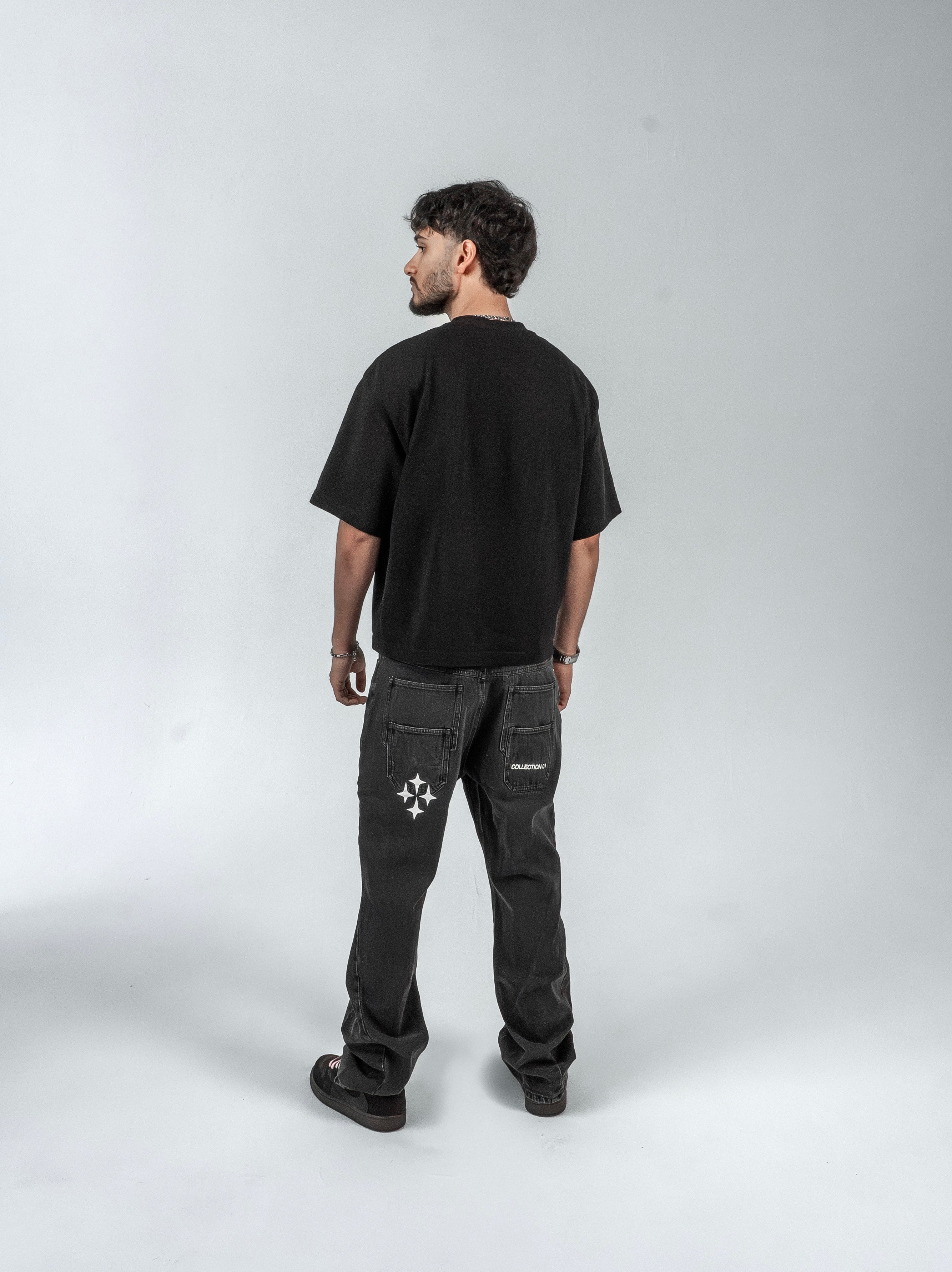 'FADED BLACK' FLARE-LEG JEANS